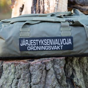 Järjestyksenvalvoja Tarranauhamerkki Selkään Musta 2 kielinen